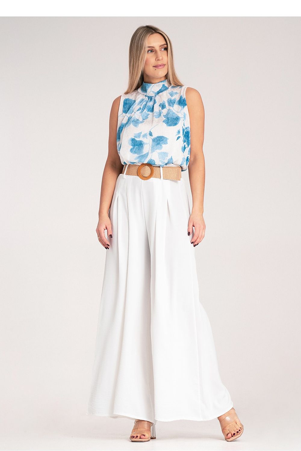 Close-up of Figl's luxury high-waisted wide trousers, highlighting the lightweight fabric and intricate woven belt design.