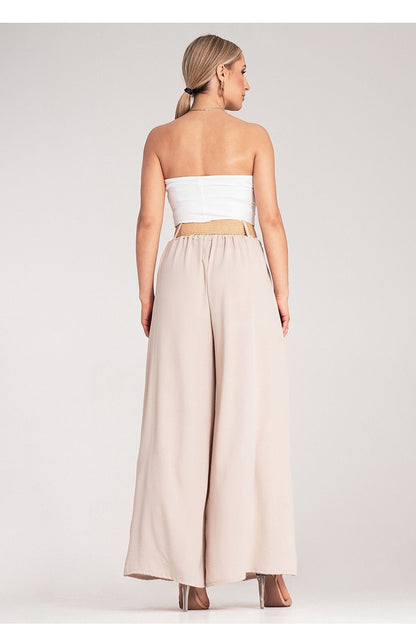 Side view of Figl's elegant high-waisted trousers with subtle pleats, demonstrating a loose fit and lightweight comfort for luxury styling.