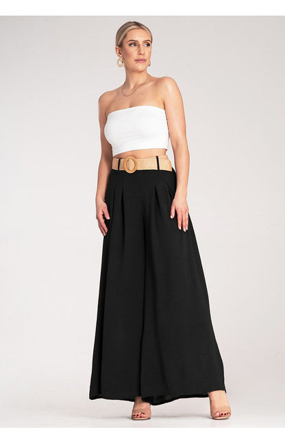 Elegant side view of Figl's luxury high-waisted wide trousers, highlighting the lightweight fabric and sophisticated pleated detail for a chic look.