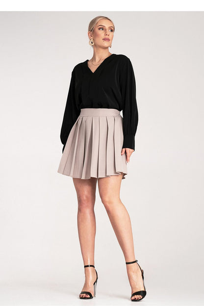 Luxury pleated mini skirt by Figl, showcasing an elegant elastic waistband and exquisite pleating, perfect for sophisticated style.