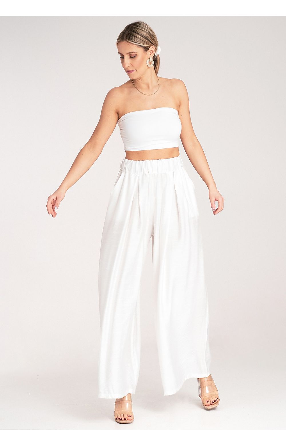 Sophisticated luxury skirt by Figl featuring a high waist and comfort-fit elastic waistband, perfect for day-to-night elegance.