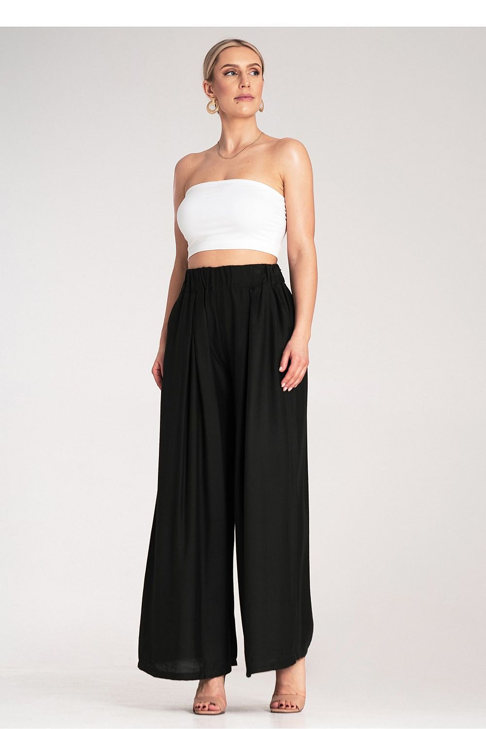 Stylish high waist skirt by Figl, crafted from 95% viscose and 5% spandex for a luxurious feel.