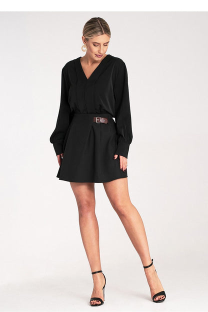 Elegant women's mini skirt by Figl featuring a light flared cut, elastic waistband, and fashionable buckle detail, perfect for chic outings.