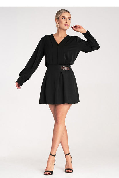 Stylish mini skirt by Figl designed with a flattering flared silhouette, highlighting an elastic waistband and side strap with buckle for a luxurious touch.