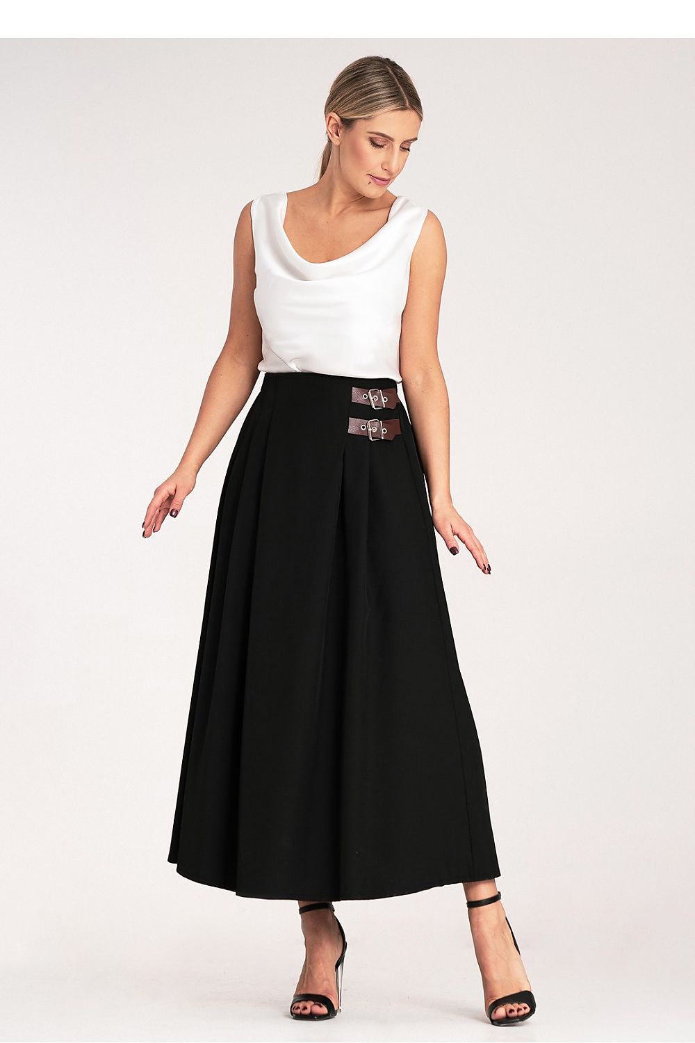 Close-up of the pleated detail on the Figl midi skirt, highlighting its sophisticated style and premium fabric.