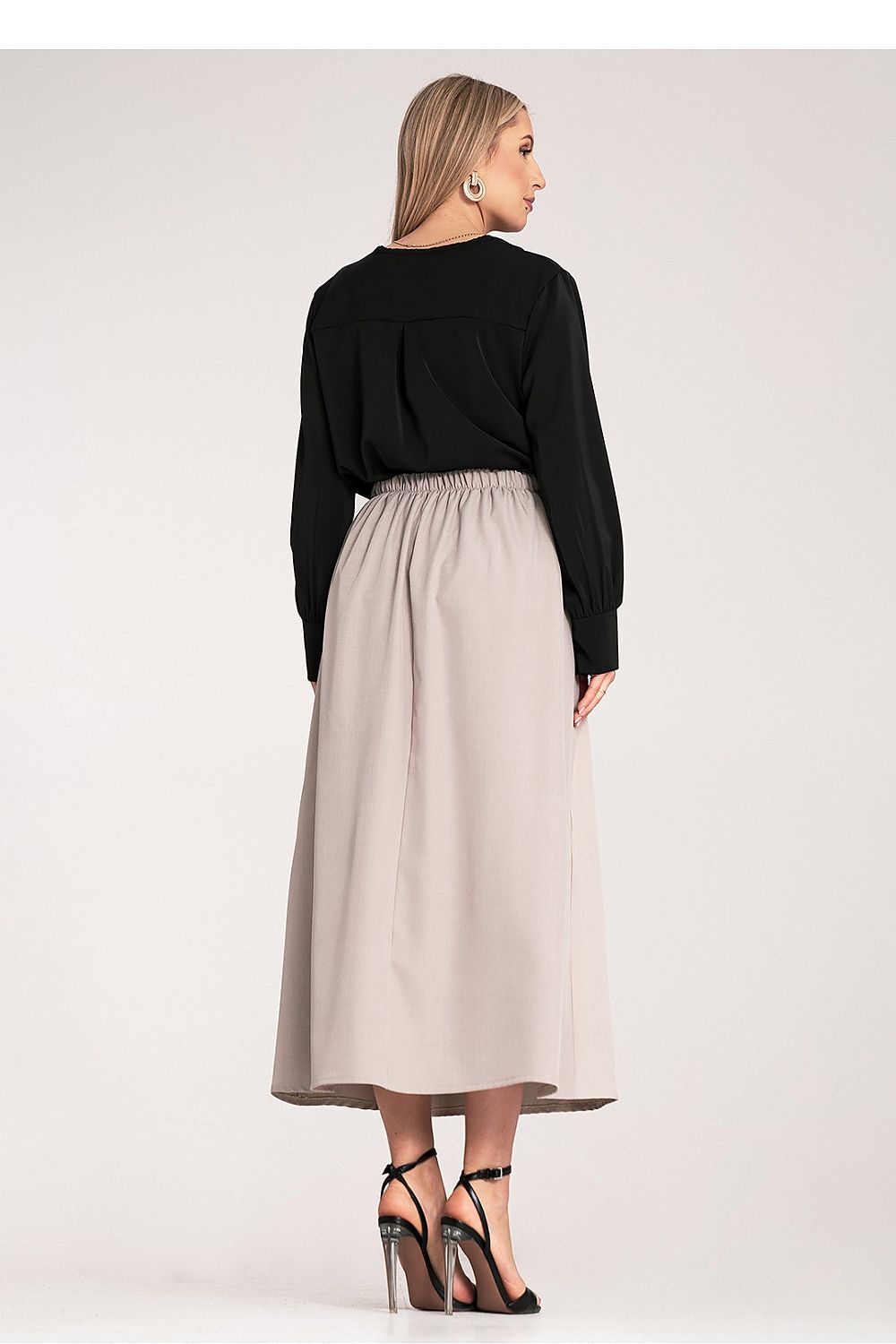 Back view of Figl Midi Skirt highlighting its elegant style with side straps and pleated design, perfect for formal and casual events.