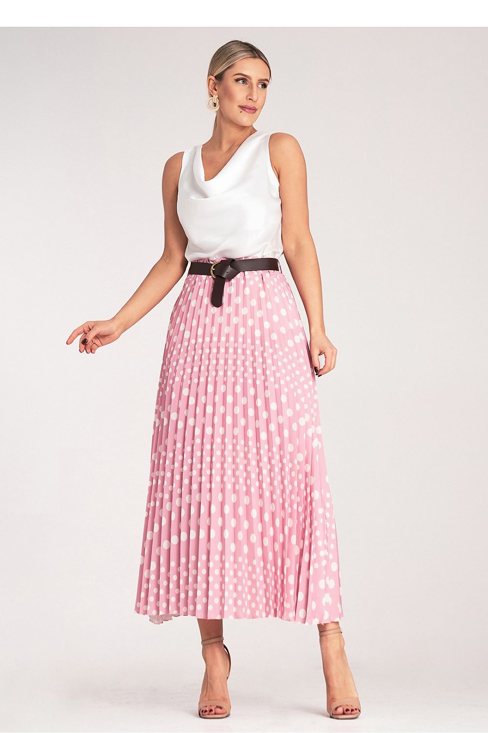 Side view of the high-waisted Figl pleated midi skirt, highlighting elegant pleats and stunning silhouette.