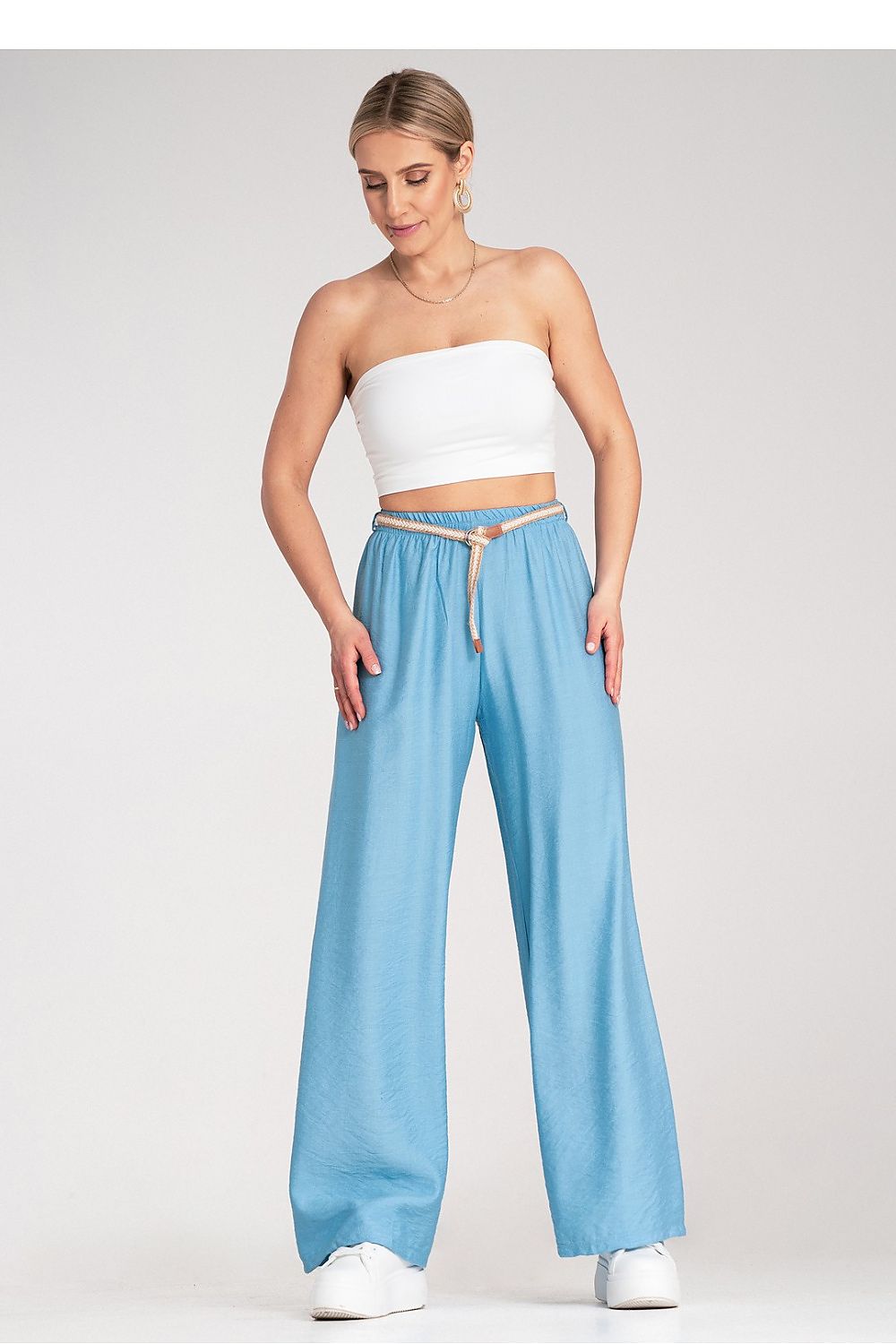 Elegant Figl women's boho trousers laid flat, highlighting the breathable viscose material and chic elastic waistband.
