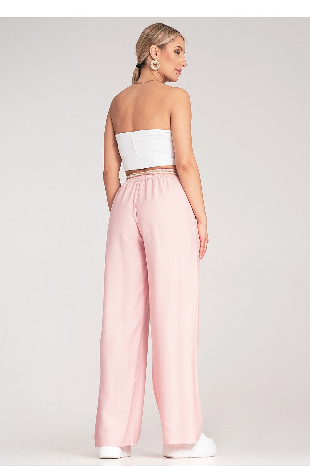 Luxury Boho women’s trousers by Figl featuring an elastic waist and decorative braided belt in a natural shade.