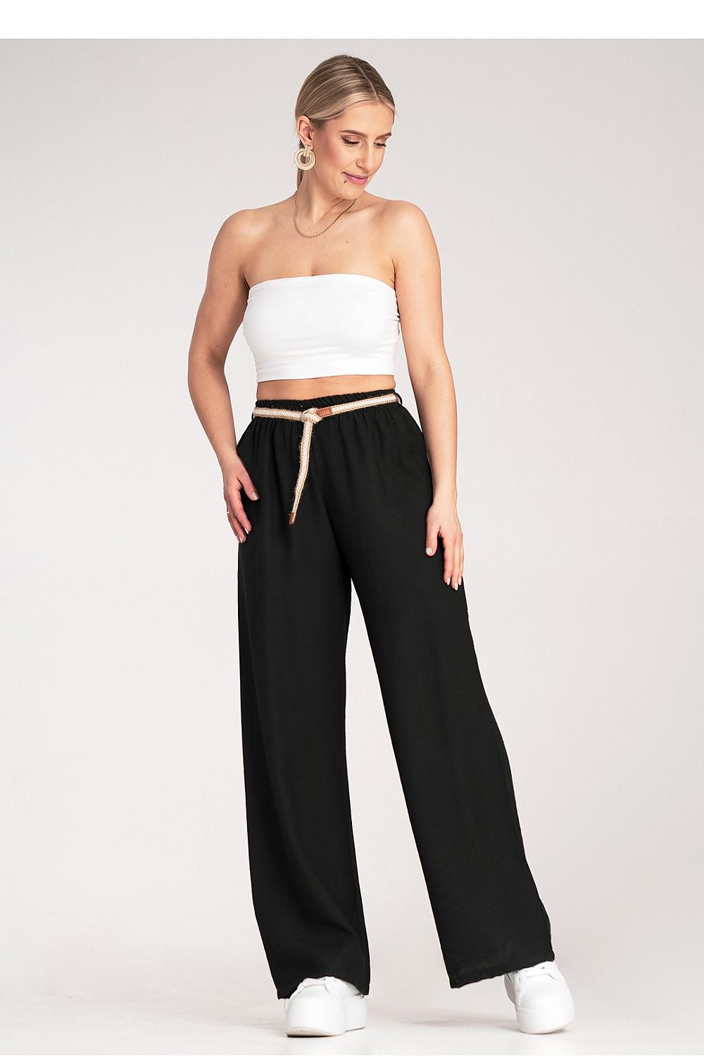 Stylish display of Figl Boho trousers worn casually, perfect for summer outings.