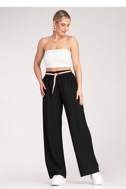 Stylish display of Figl Boho trousers worn casually, perfect for summer outings.