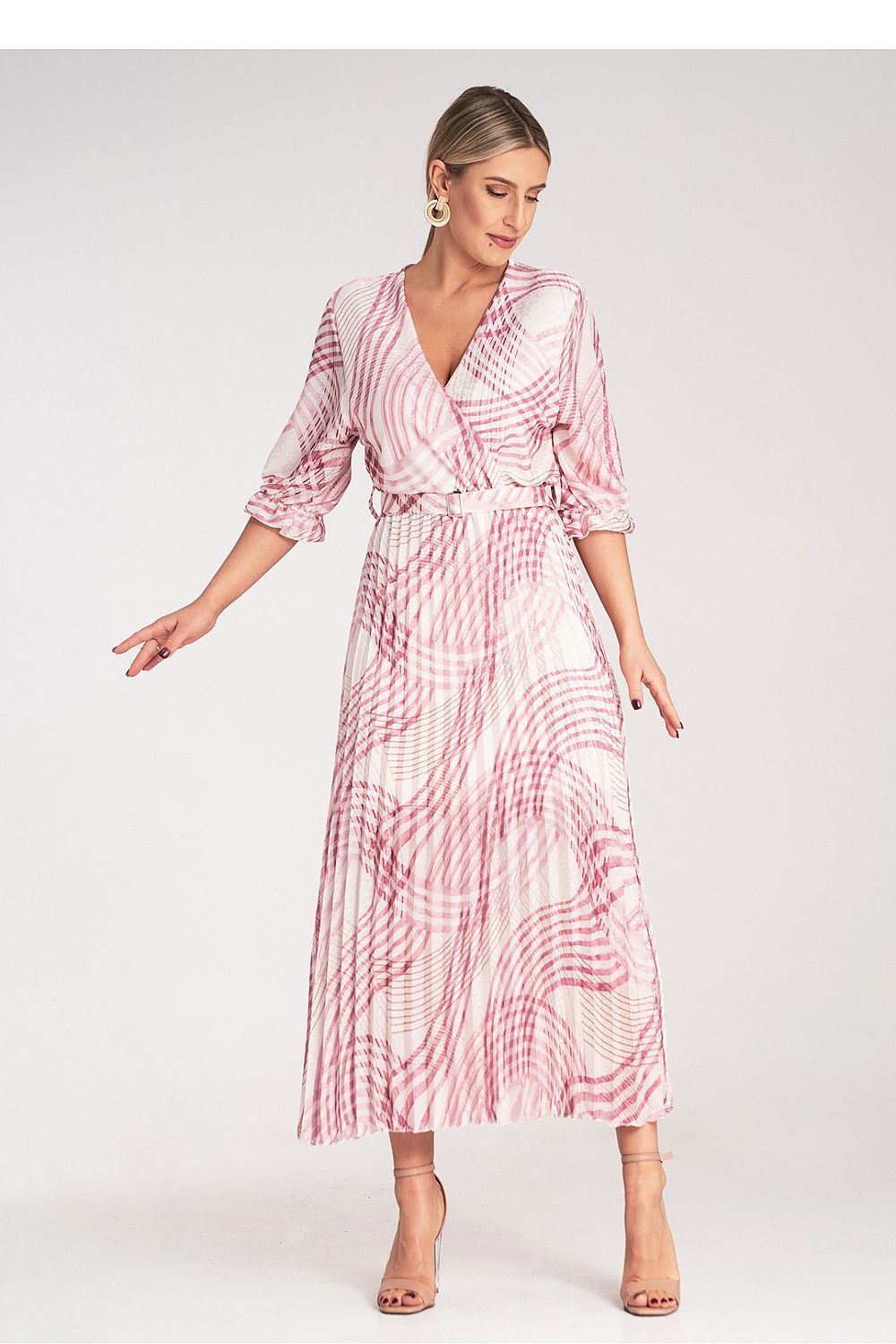 Luxury leopard print maxi dress with long elastic cuff sleeves by Figl, showcasing a flattering pleated bottom ideal for stylish outings.