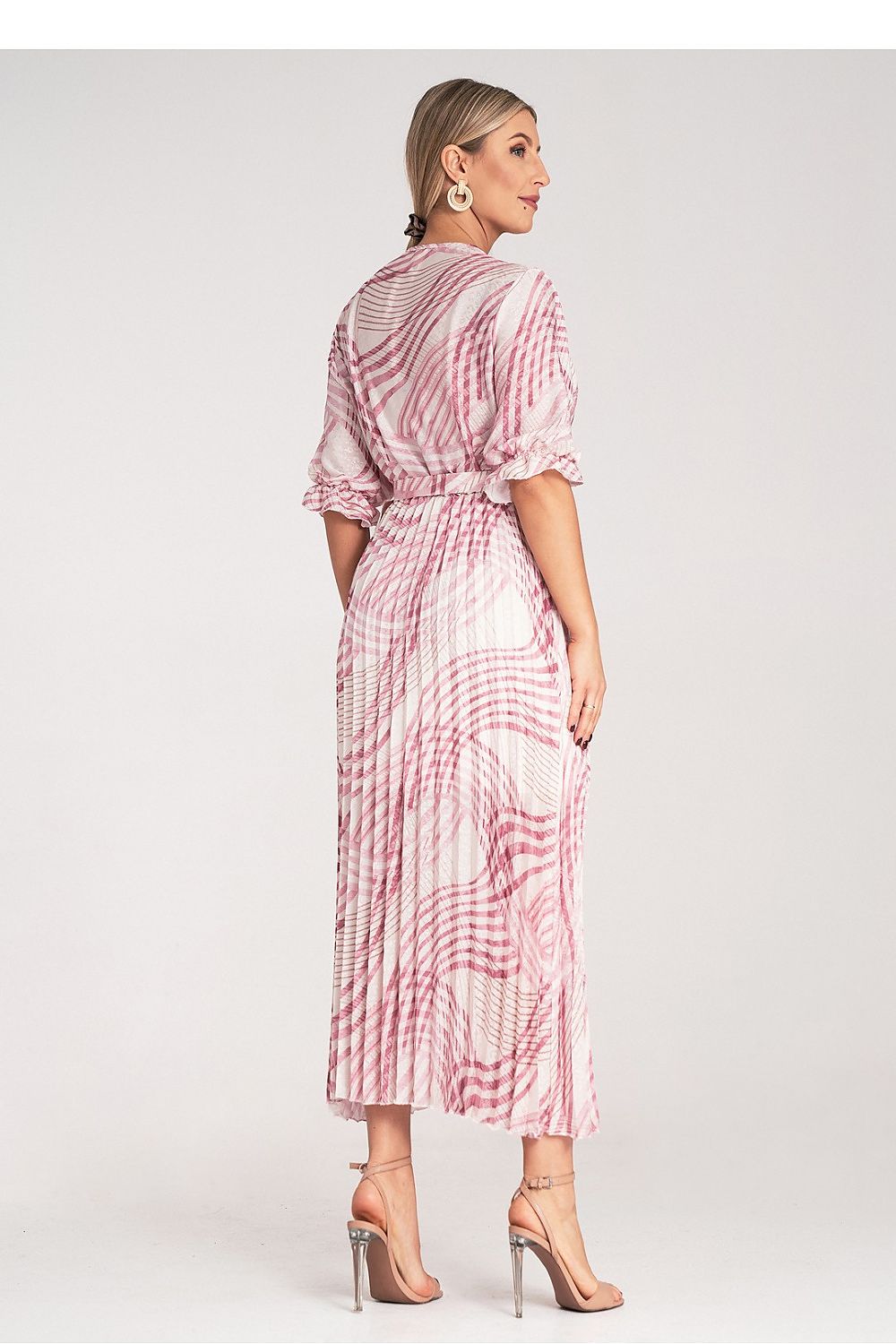 Figl satin leopard print maxi dress, designed with a confident wrap neckline and elastic waistband, exuding glamour and elegance.