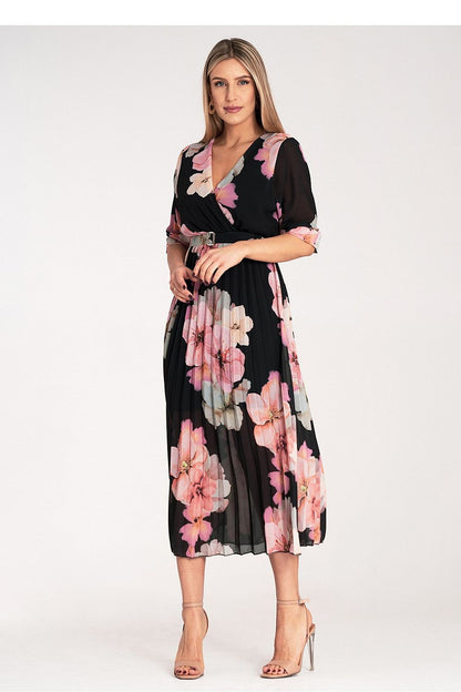Stunning floral pattern on a Figl midi dress, complemented by an elastic waistband and a stylish belt, creating a flattering silhouette.