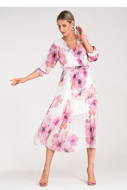 Versatile Figl floral print midi dress, highlighting a feminine wrap neckline and fashionable pleats, suitable for both casual and formal settings.