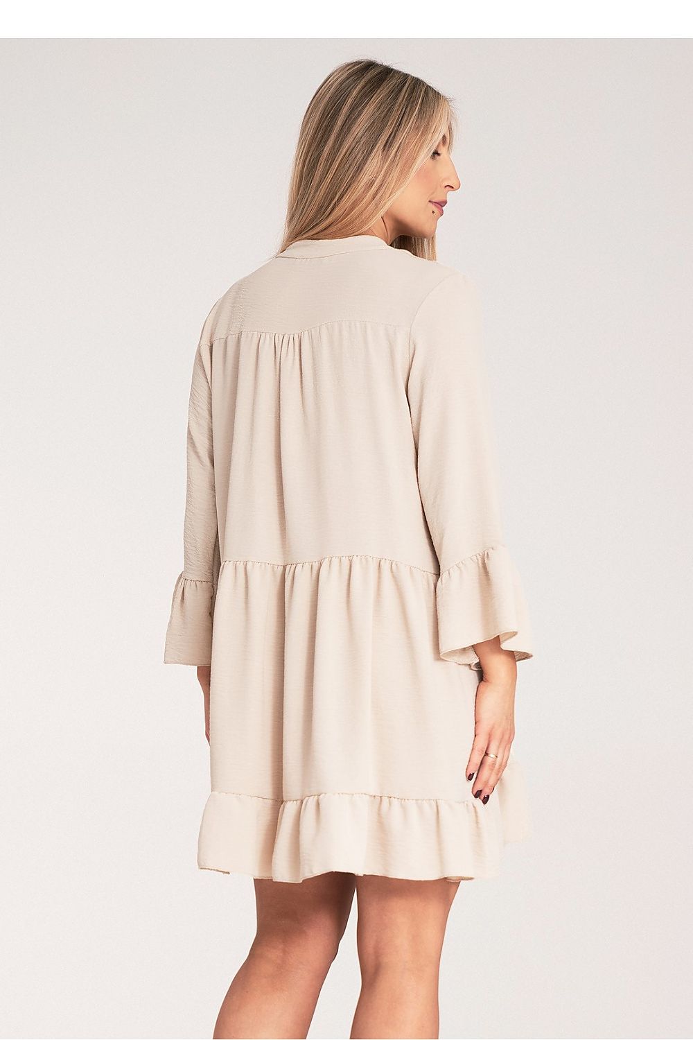 Feminine Figl Loose Ruffle Daydress displaying ruffled detailing and a classy V-Neck, ideal for fashionable occasions.