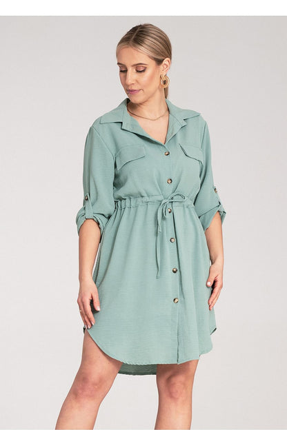 Elegantly styled Figl Classic Button-Up Shirt Dress with adjustable sleeves, showcasing a classic collar and two chest pockets, perfect for a refined adult wardrobe.