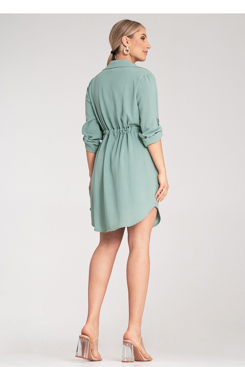 Model wearing the Figl Classic Button-Up Shirt Dress, illustrating the versatility of the adjustable sleeves rolled up for a casual yet sophisticated look.