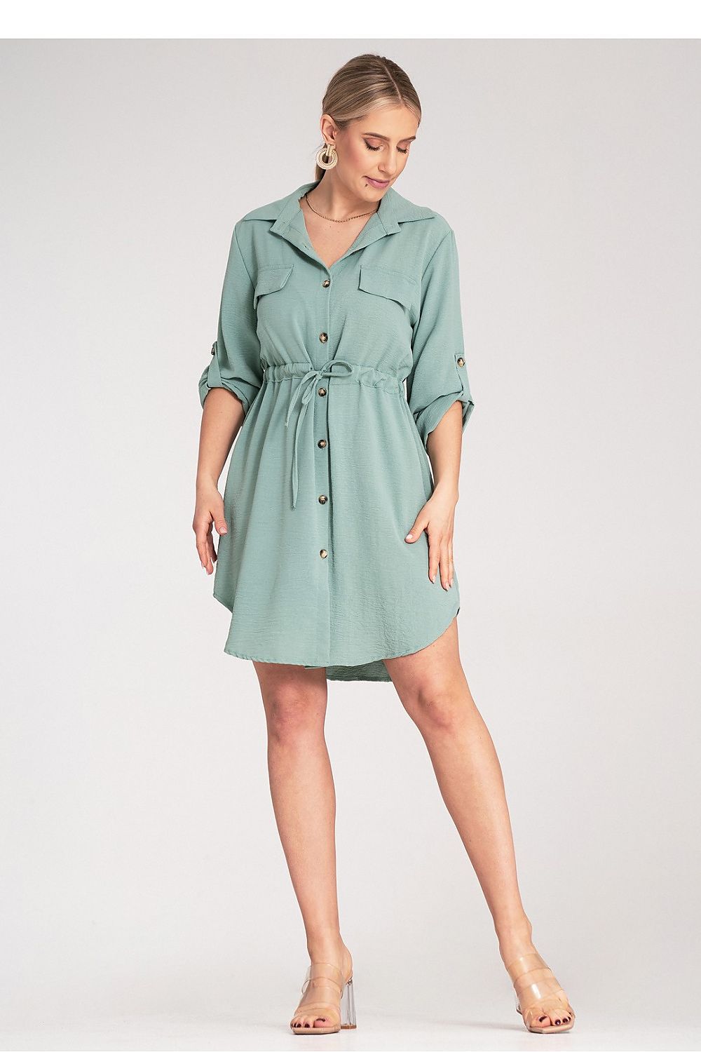 The graceful design of the Figl Classic Button-Up Shirt Dress displayed against a neutral backdrop, emphasizing its stylish cut and premium materials.
