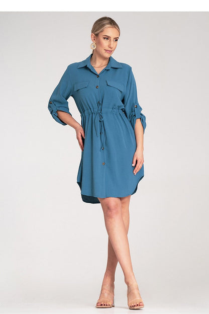 Figl Classic Button-Up Shirt Dress in EU S/M | US S/M, featuring adjustable sleeves, a waist tie, and two chest pockets, perfect for a sophisticated and stylish look.