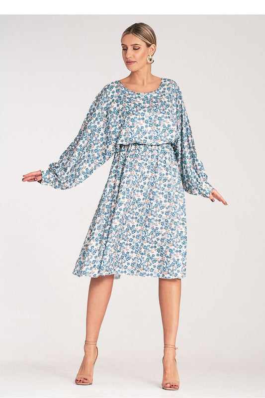 Elegant luxury floral midi dress by Figl, showcasing a kimono-style cut with loose sleeves and cuffs against a sophisticated backdrop.