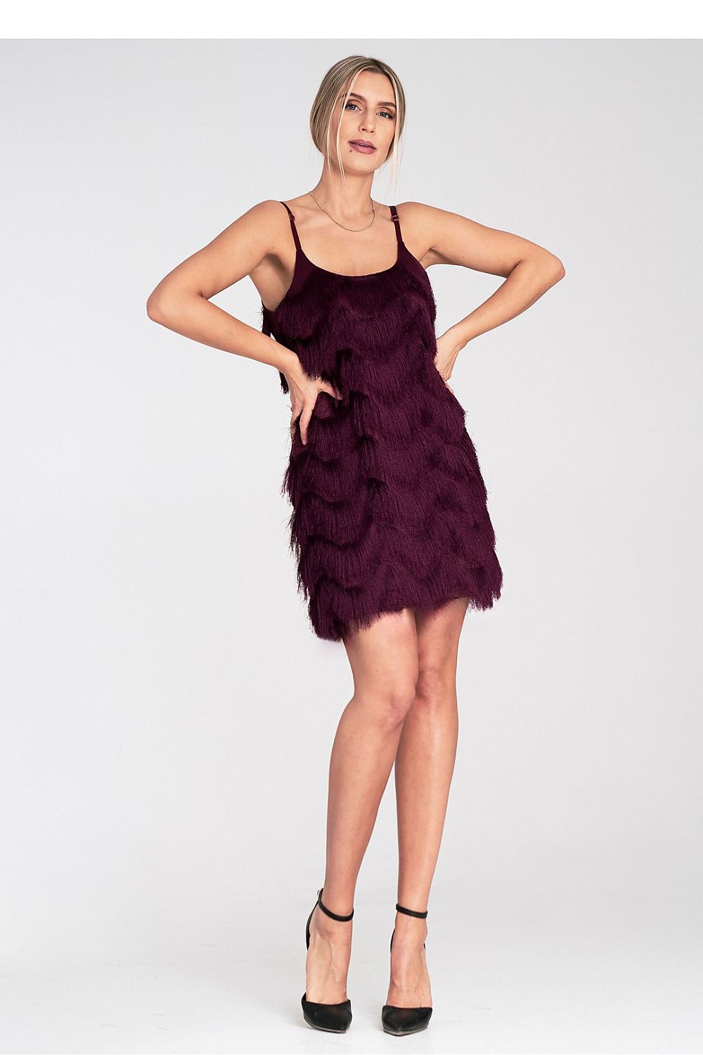 Elegant luxury maxi evening dress by Figl featuring decorative fringes and adjustable straps, perfect for sophisticated occasions.