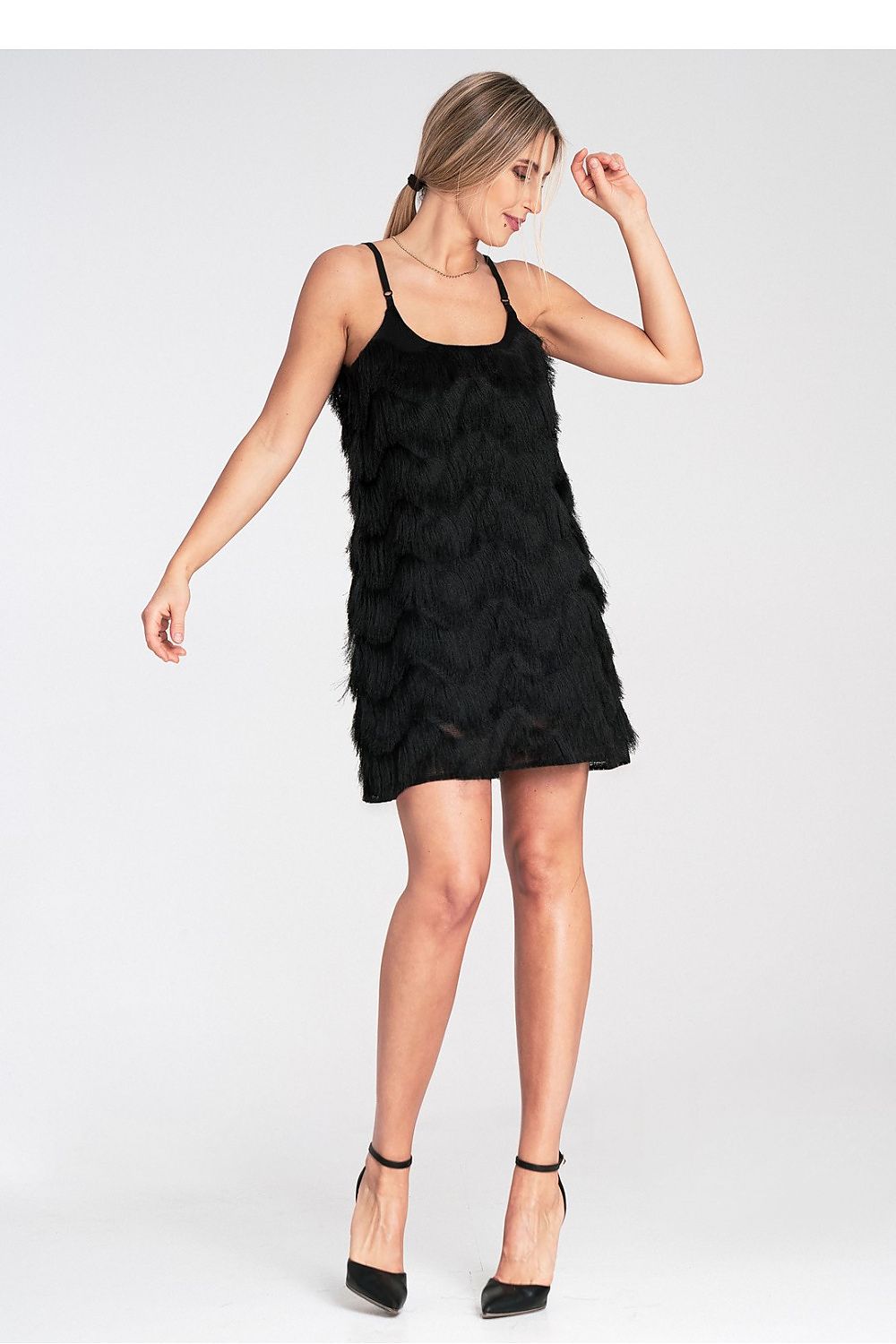 Model wearing Figl luxury maxi evening dress, highlighting its elegant silhouette and adjustable straps for a perfect fit at evening events.