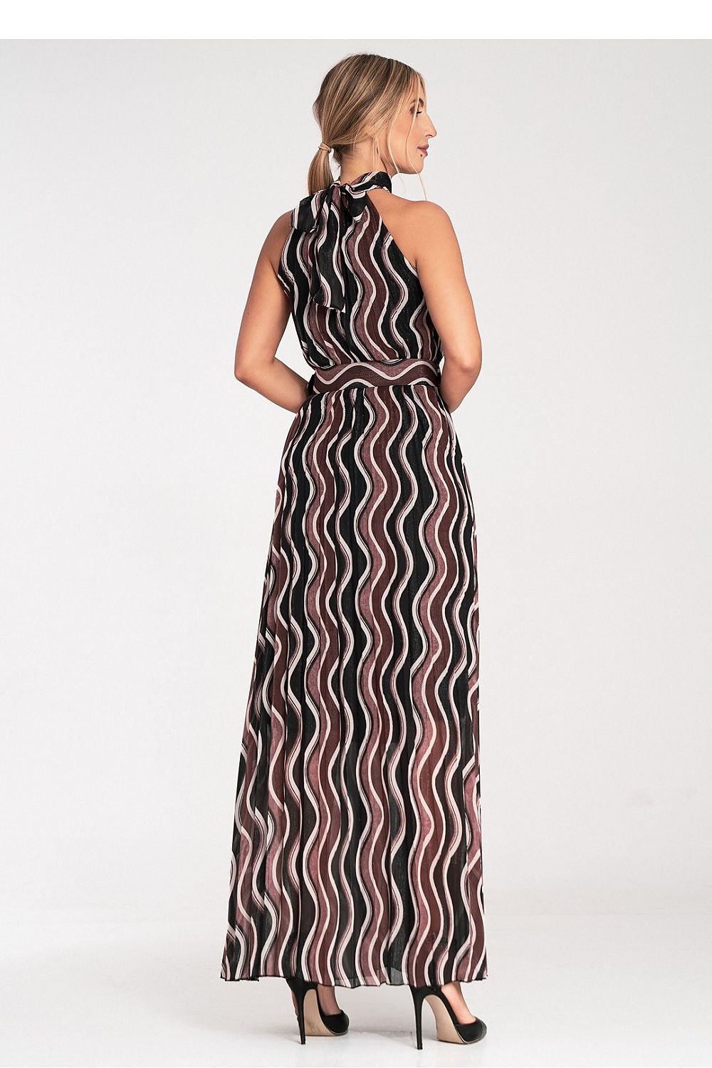 Elegant Figl Maxi Dress showcasing bare shoulders and intricate pleated design, embodying luxury and sophistication in fashion.