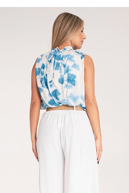 Chic Figl blouse in sleeveless style, designed with a fashionable tied neck and elastic hem, ideal for stylish layering.