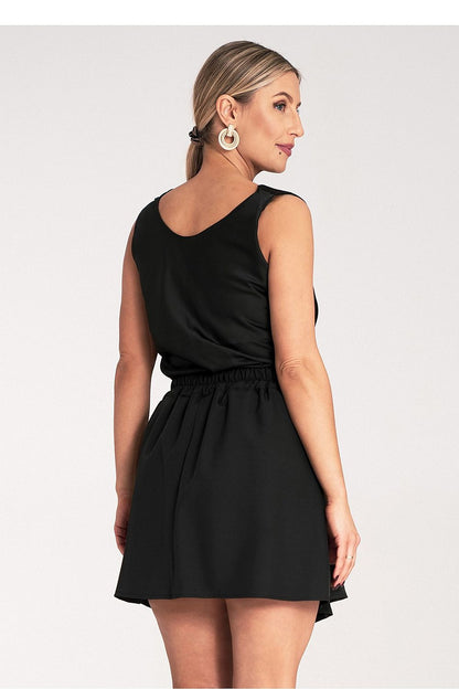 Stylish Figl satin blouse displayed on a mannequin, emphasizing the luxe thicker straps and tailored fit for EU S/M | US S/M sizes.