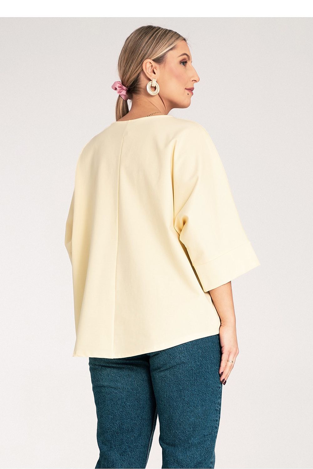 Elegant loose fit luxury kimono blouse by Figl with floral details, perfect for stylish occasions.