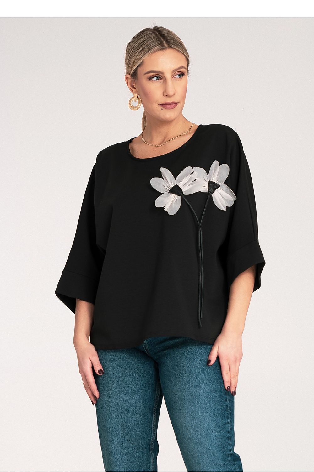 Full view of the luxury kimono blouse by Figl, showcasing its round neckline and wider cuff sleeves, ideal for an upscale wardrobe.