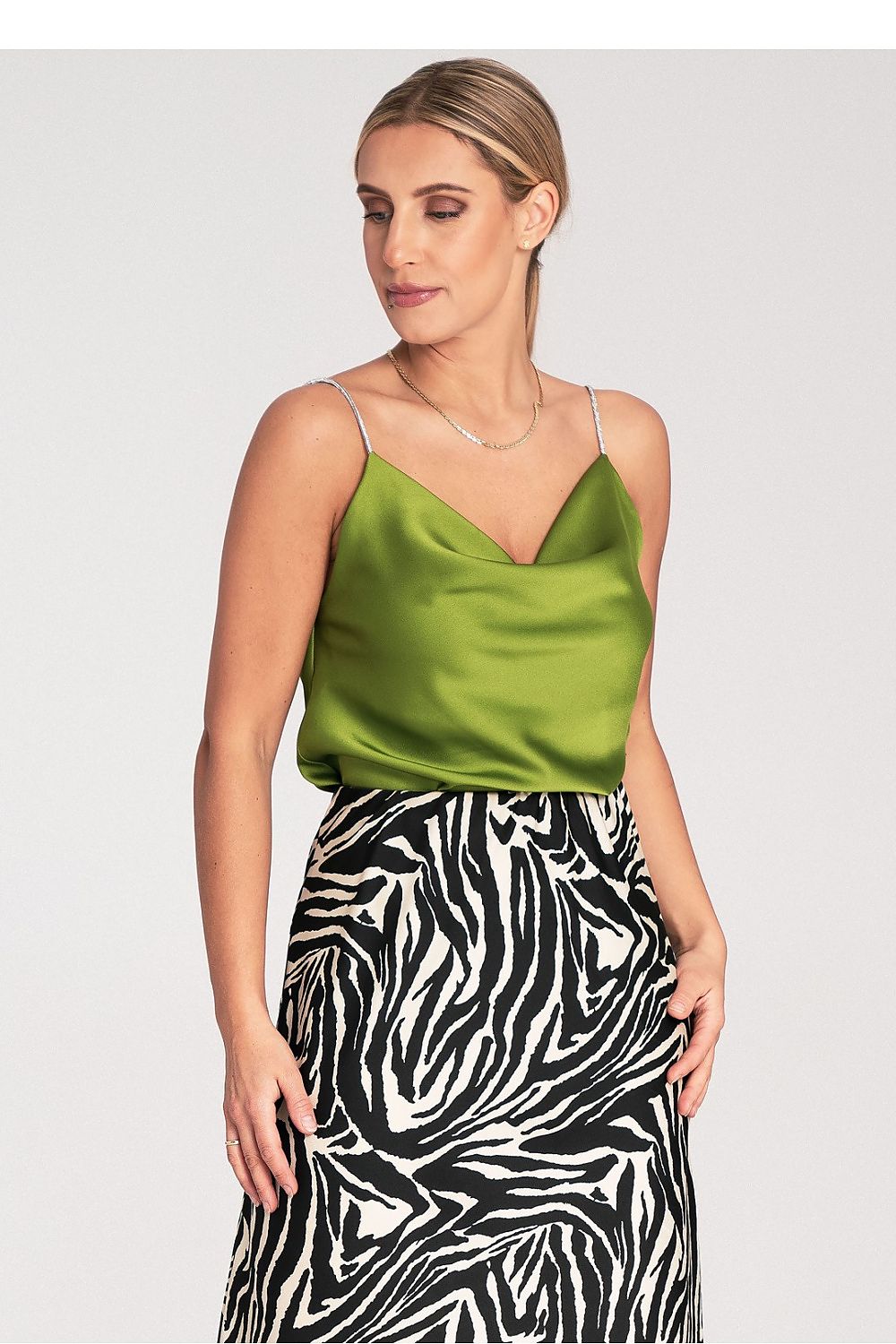 Model wearing Figl satin top with crystal straps, styled for a chic and elegant outfit in EU S/M and US S/M sizes.