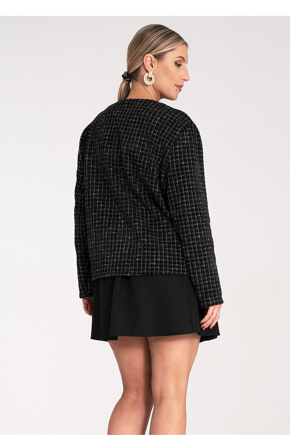 Model wearing the Chic Checked Tweed Blazer with Golden Buttons by Figl, demonstrating a sophisticated outfit combination.