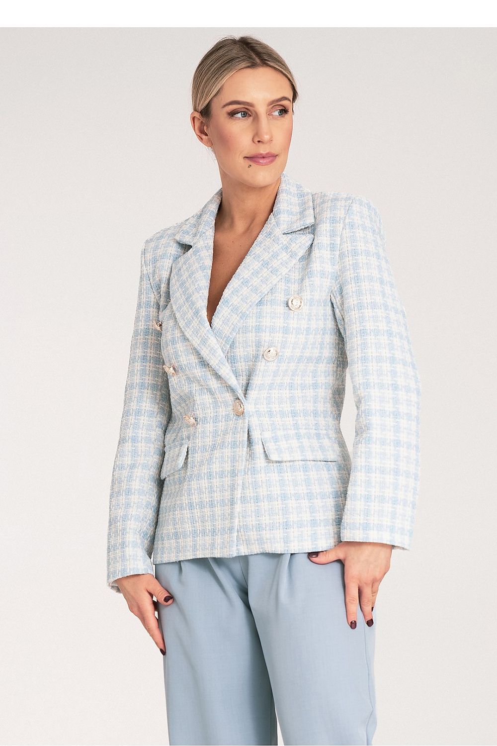 Fully displayed double-breasted checkered jacket by Figl, highlighting the richness of the jacquard material and sophisticated golden button detailing.