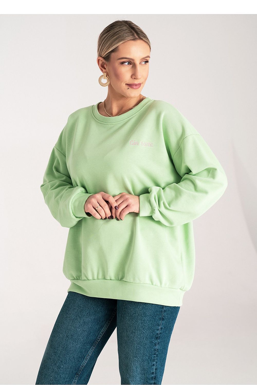 Luxury loose women's sweatshirt by Figl featuring elegant embroidered detail and classic round neck design in size S/M.