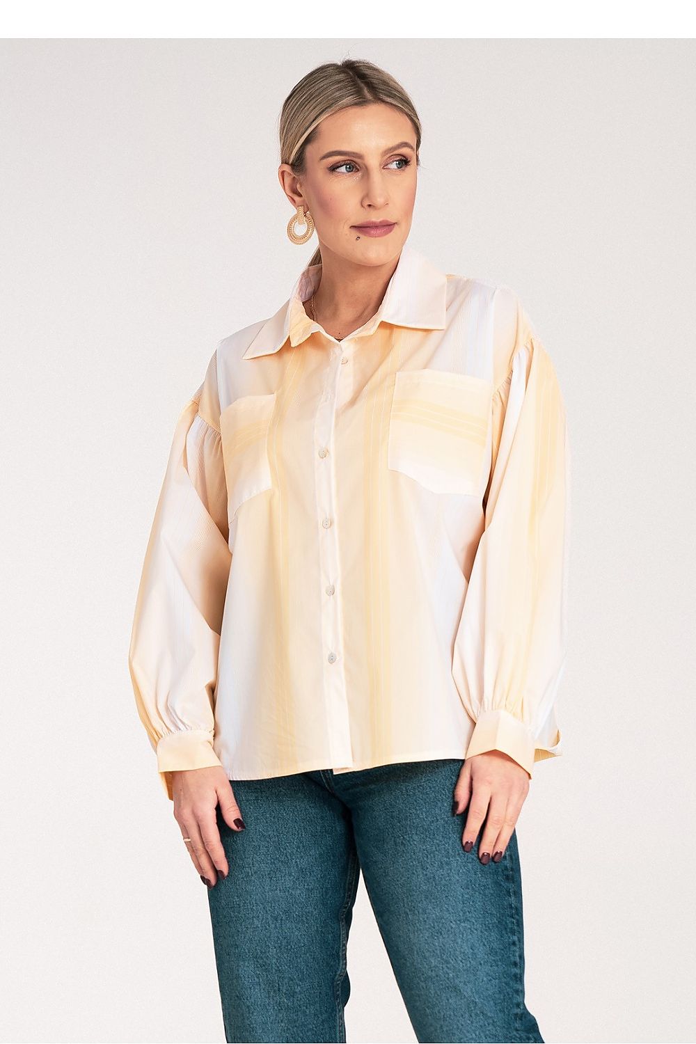 Close-up of Figl Women's Long Sleeve Shirt showcasing the intricate gathering detail on voluminous sleeves, ideal for sophisticated styling.