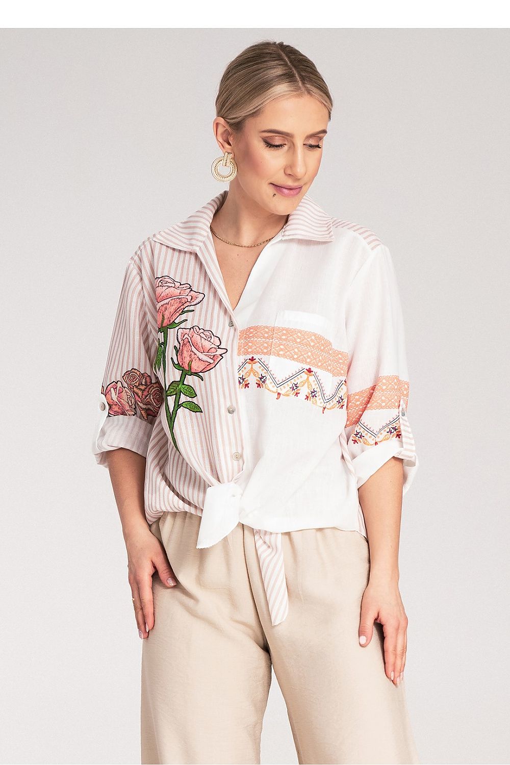 Luxurious Figl Women's asymmetrical striped shirt featuring intricate floral embroidery, perfect for an elegant and stylish look.