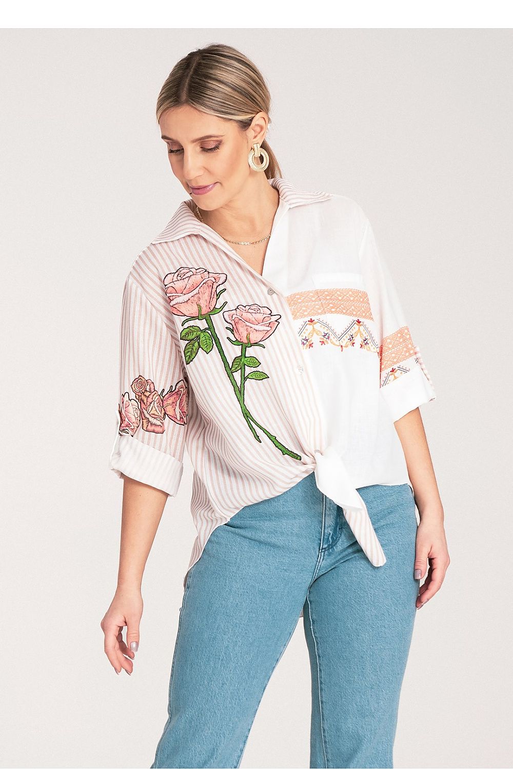Stylish and versatile Figl Women's shirt, showcasing a loose fit design complemented by floral motifs, suitable for any occasion.