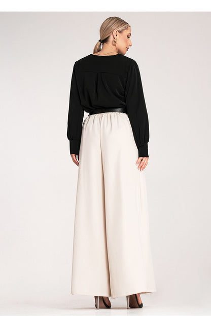 Sophisticated palazzo trousers with an elastic waistband by Figl, designed in a delicate fabric, ideal for both casual and formal occasions.