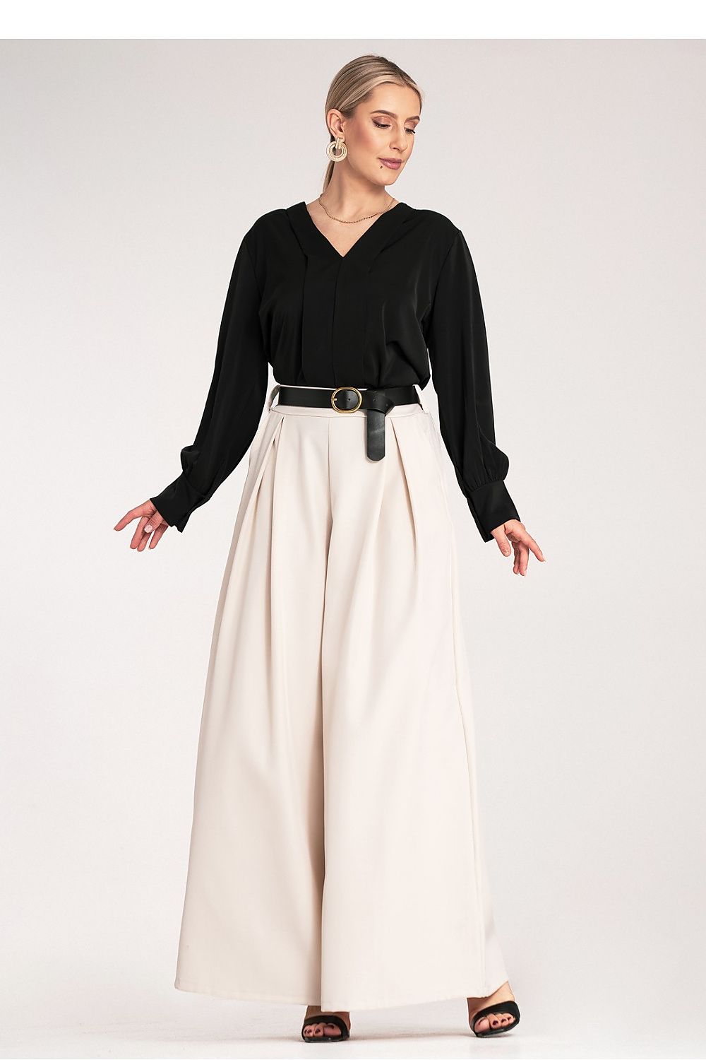 Luxury high-waisted palazzo trousers featuring slit pockets and a contemporary design by Figl, tailored for ultimate comfort and style.