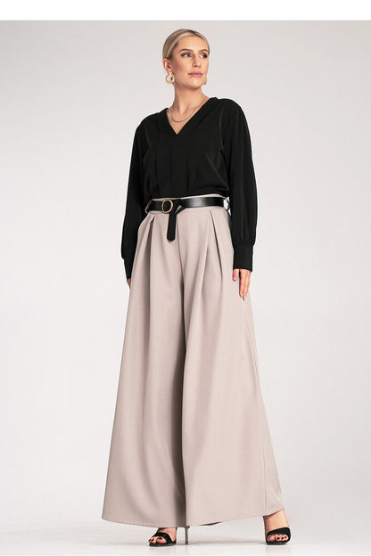 Stunning palazzo trousers in EU S/M size by Figl, showcasing a modern silhouette and crafted from lightweight material for elegant movement.