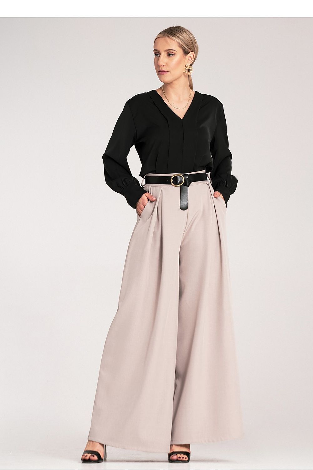 Chic black palazzo trousers with a stylish belt by Figl, designed for the modern woman seeking elegance and versatility in her wardrobe.