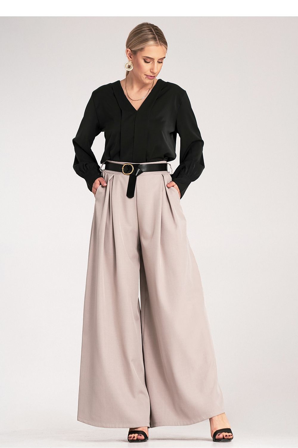 Sophisticated high-waisted palazzo pants showcasing wide legs and a flattering silhouette, crafted by Figl.