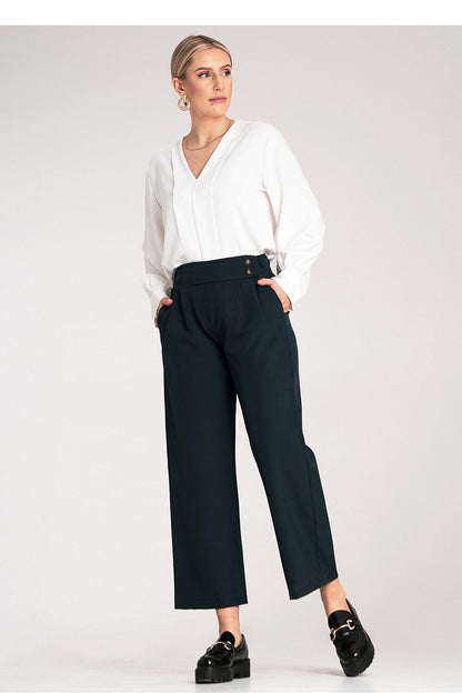 Close-up view of Figl's elegant high-waisted 7/8 trousers showcasing the exquisite decorative button detail.