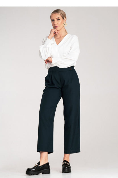 Fashionable high-waisted 7/8 trousers by Figl displayed in a stylish setting, highlighting their versatility and elegance.