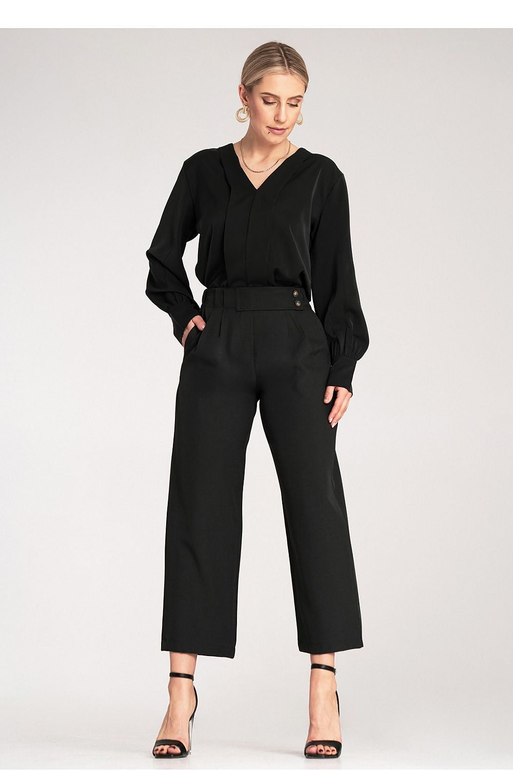 Luxury high-waisted 7/8 trousers for women by Figl, displaying refined decorative buttons and pleated front, ideal for fashion-forward individuals.