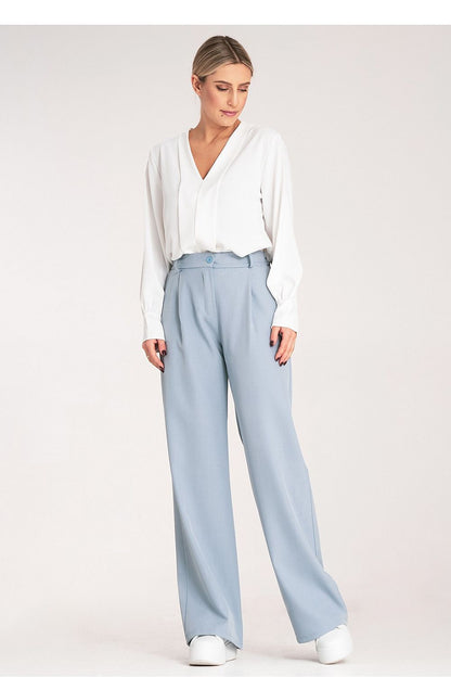 Figl Women's elegant high-waisted trousers displayed on a mannequin, highlighting their stylish loose fit and belt loops for versatile outfit options.