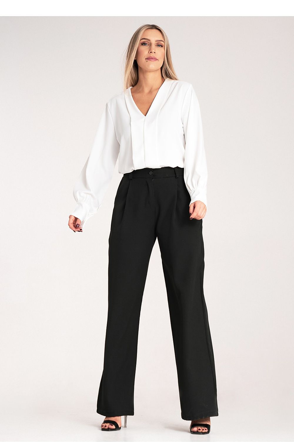 Stylish Figl Women's high-waisted trousers photographed against an elegant backdrop, ideal for chic and sophisticated looks.