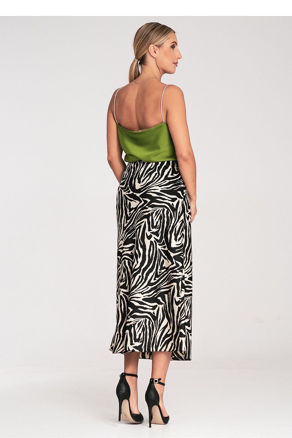 Model wearing Figl's luxury satin midi skirt, highlighting the stylish drape and comfort of the elastic waist.